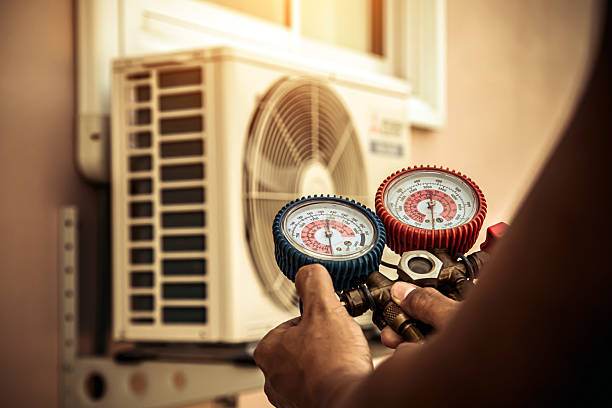 Professional Air Conditioning Service technician working in Altoona, IA